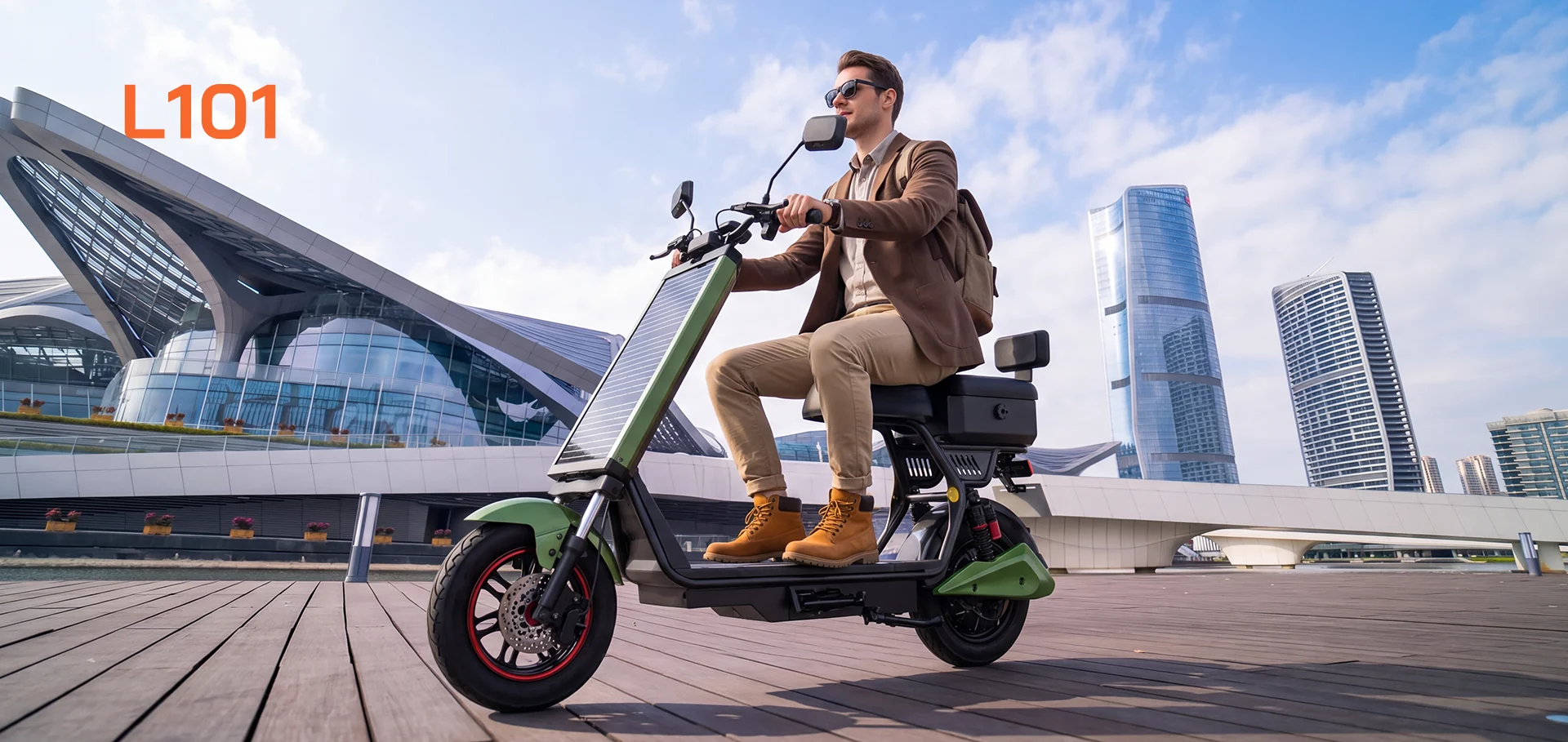 A rider on the green Laineng L101 solar electric moped in a modern city plaza